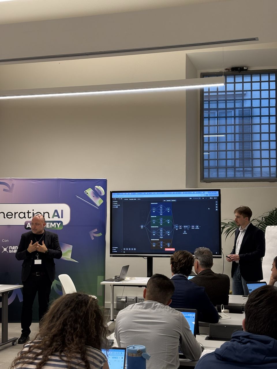 A Generation AI Academy classroom, with the students working on their laptops